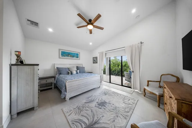 a kitchen with kitchen island granite countertop stainless steel appliances and sink