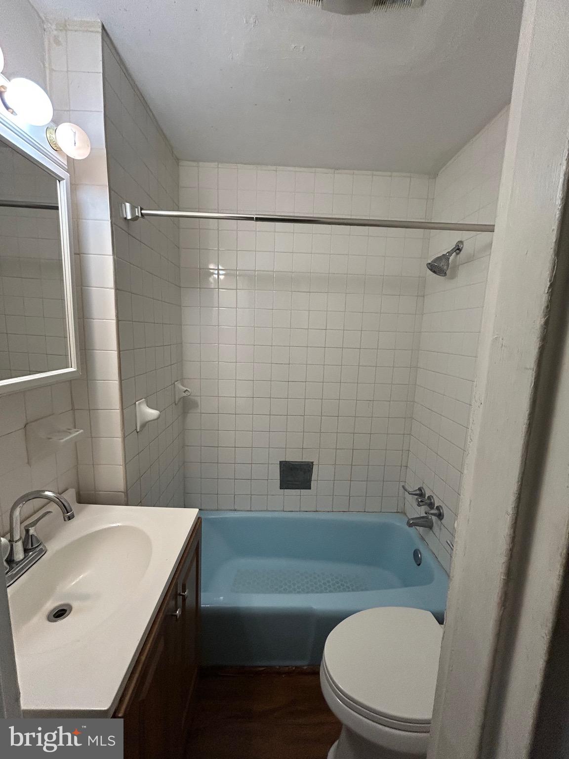 6426 North Capitol Street Northwest Washington, DC 20012 - Photo 12 of 18 a bathroom with a sink a toilet and shower