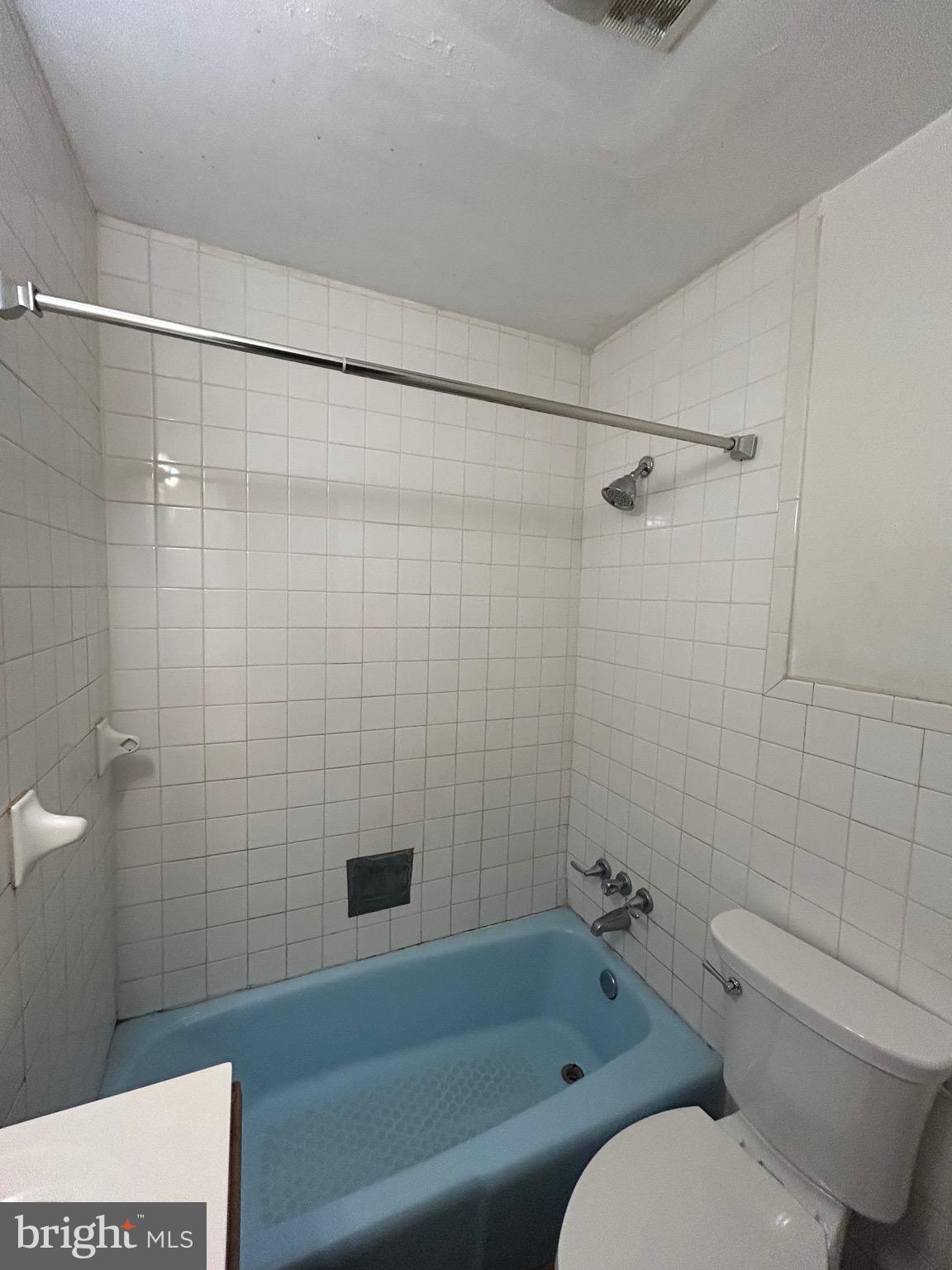 6426 North Capitol Street Northwest Washington, DC 20012 - Photo 13 of 18 a bathroom with a toilet and shower