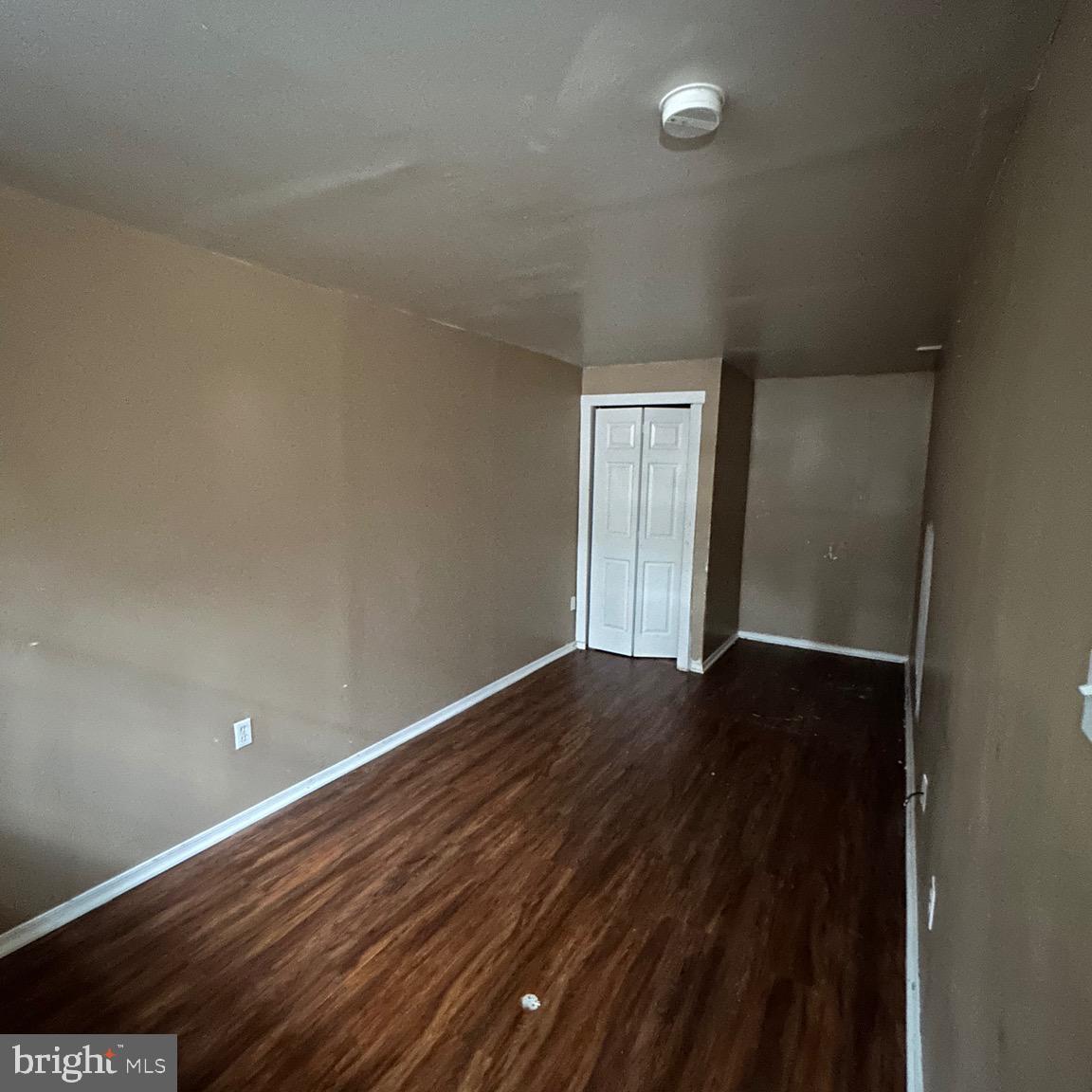 6426 North Capitol Street Northwest Washington, DC 20012 - Photo 14 of 18 a view of an empty room and wooden floor