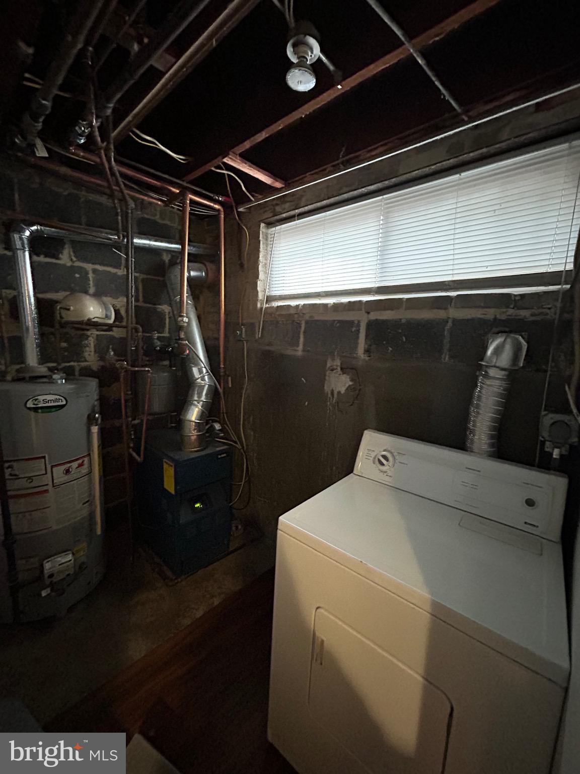 6426 North Capitol Street Northwest Washington, DC 20012 - Photo 15 of 18 a utility room with dryer and washer