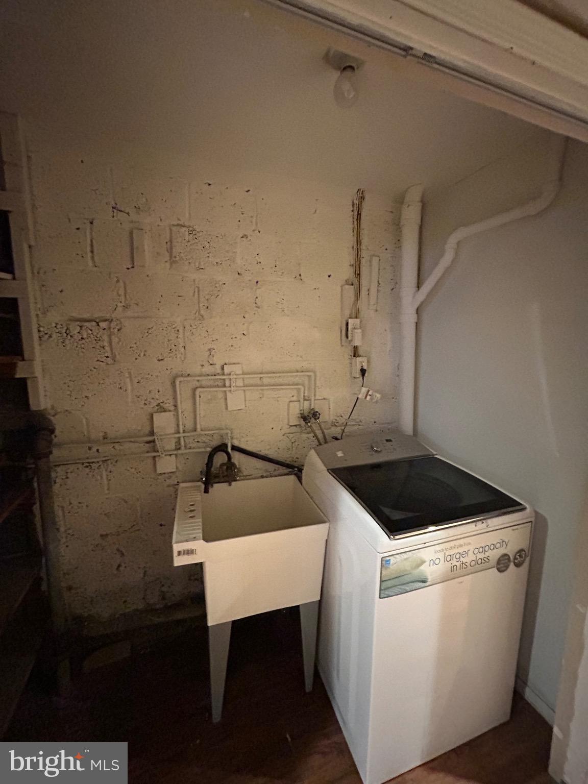 6426 North Capitol Street Northwest Washington, DC 20012 - Photo 16 of 18 a utility room with dryer and washer