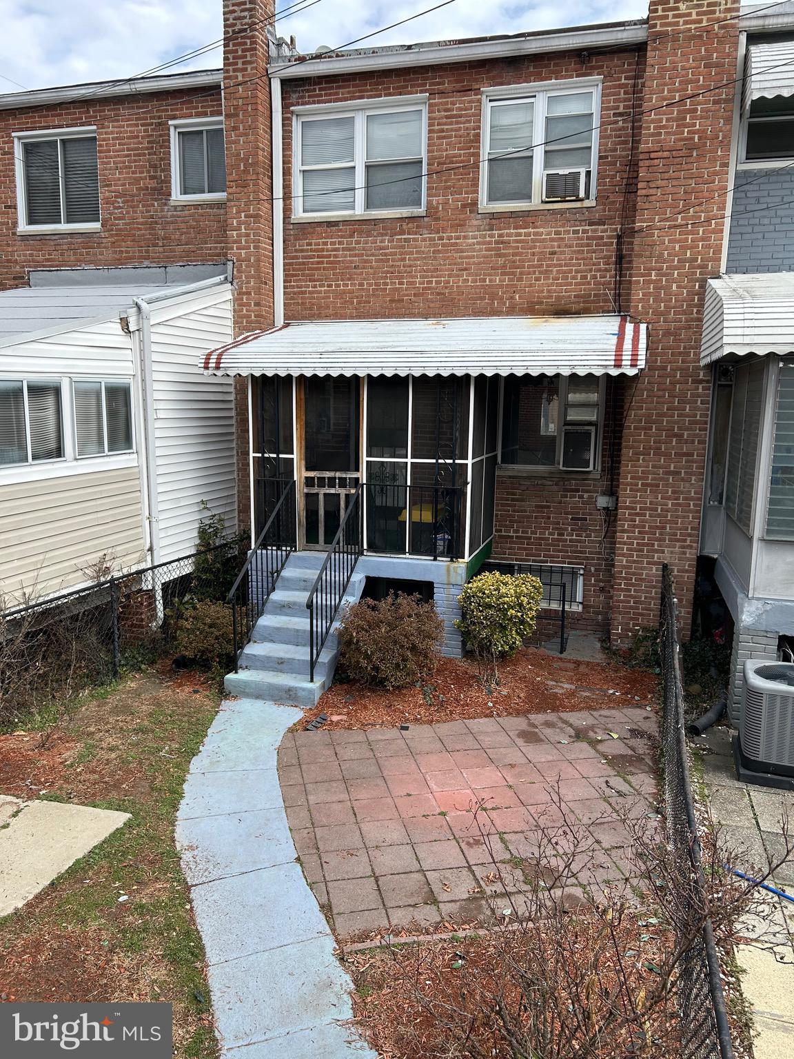 6426 North Capitol Street Northwest Washington, DC 20012 - Photo 18 of 18 a front view of a house with garden