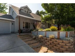 a view of a house with a street