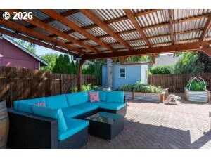 a view of yard with patio