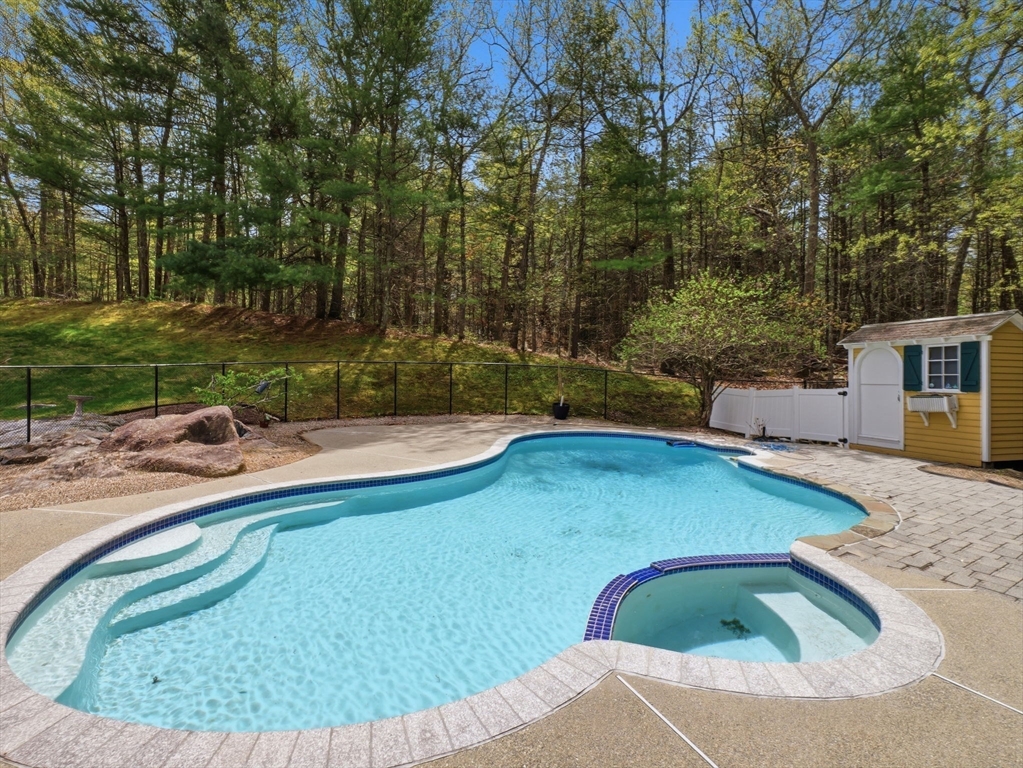 10 Hawk Ridge Road Andover, MA 01810 - Photo 31 of 32 a view of a swimming pool with a yard and sitting area