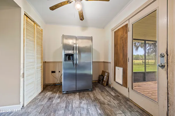 a kitchen with stainless steel appliances a sink stove and cabinets