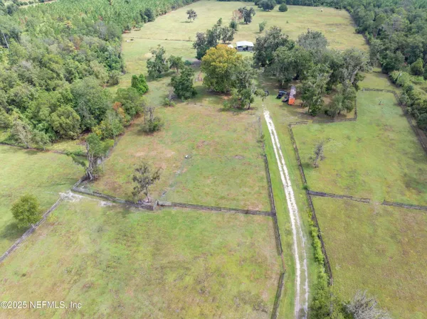 a view of a lake with a big yard