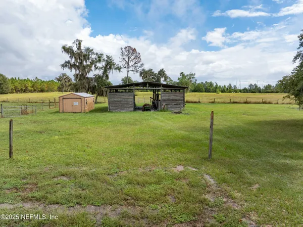 an aerial view of residential houses with swimming pool