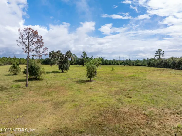 a view of outdoor space and yard