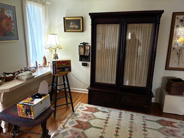 4577 Emerson Road South Euclid, OH 44121 - Photo 7 of 48 Living area featuring wood finished floors and an office area