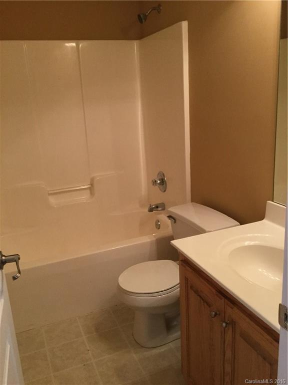 1906 Fletcher Broome Road Monroe, NC 28112 - Photo 14 of 15 a bathroom with a tub