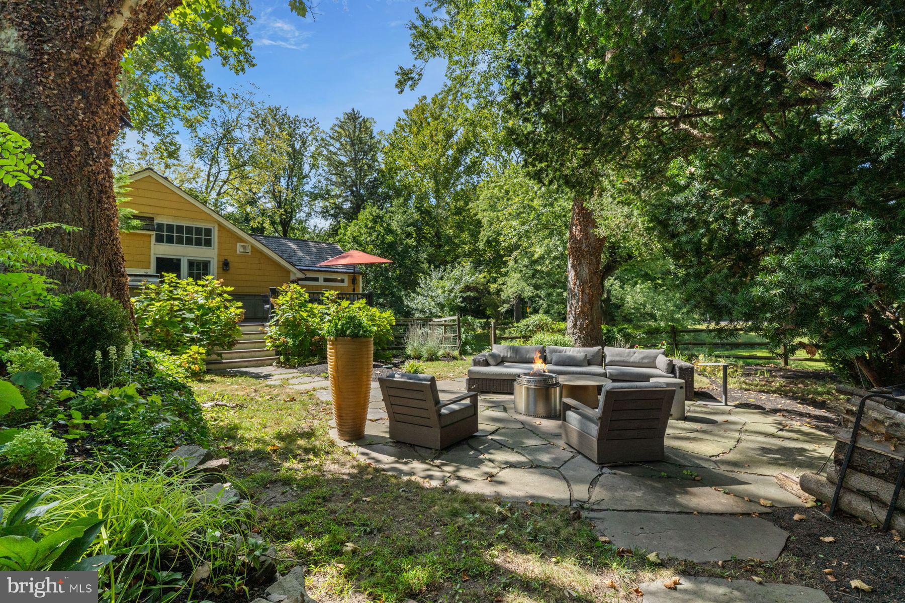 2472 River Road New Hope, PA 18938 - Photo 16 of 50 a view of backyard of house with patio