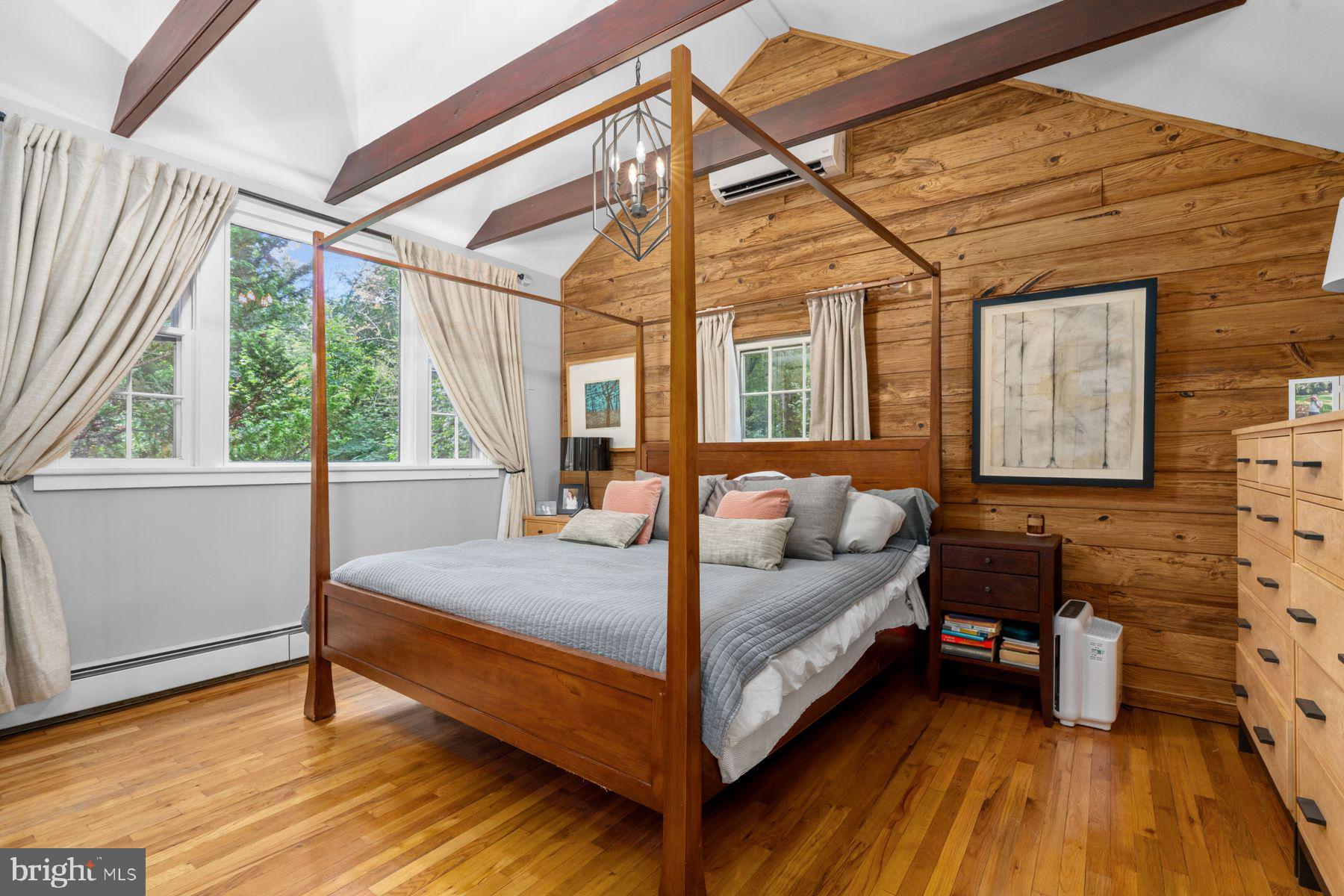 2472 River Road New Hope, PA 18938 - Photo 25 of 50 a bedroom with a bed and a large window