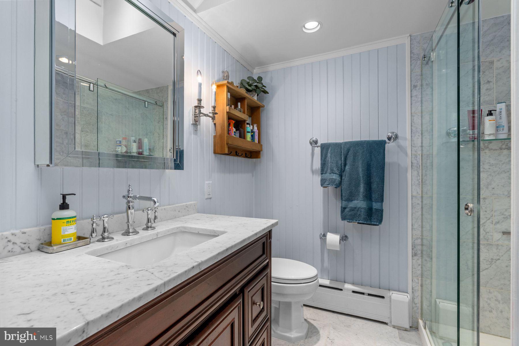 2472 River Road New Hope, PA 18938 - Photo 27 of 50 a bathroom with a granite countertop sink a toilet and mirror