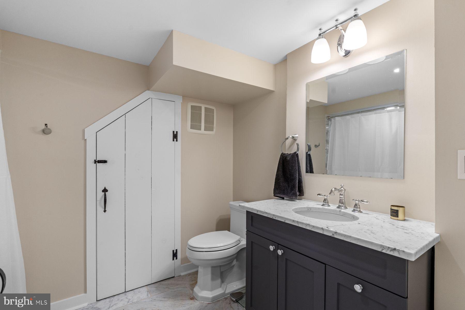 2472 River Road New Hope, PA 18938 - Photo 38 of 50 a bathroom with a granite countertop sink toilet and shower