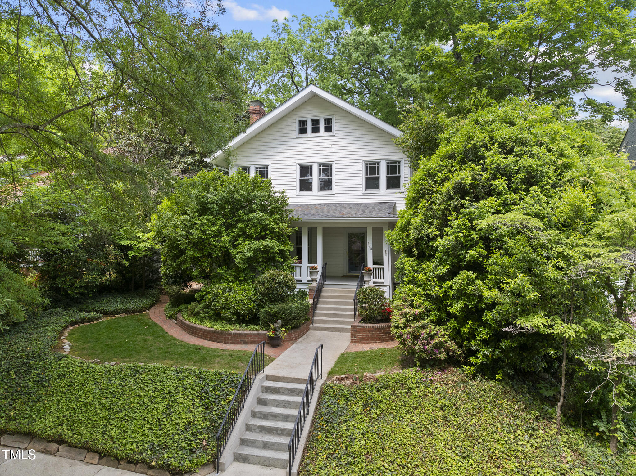 223 Hawthorne Road Raleigh, NC 27605 - Photo 1 of 47 a front view of a house with a yard