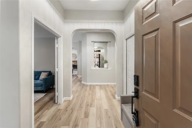 a view of a bedroom from a hallway