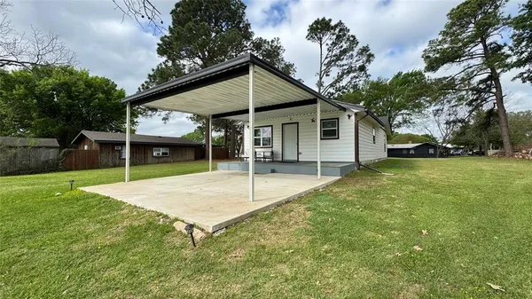 a house view with a outdoor space