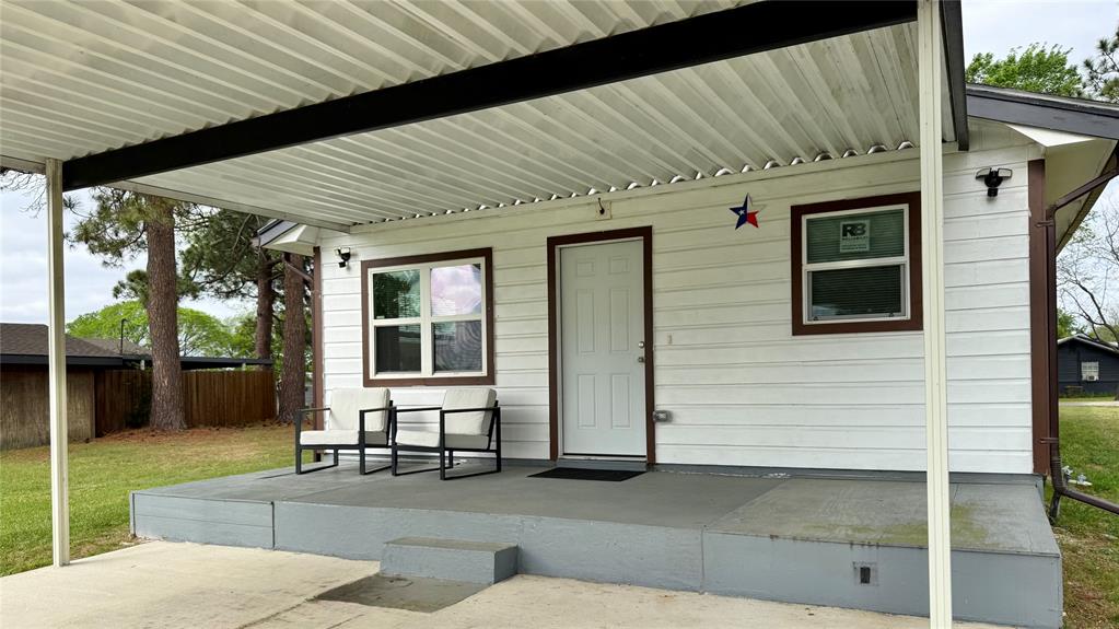 191 Harmon Road Gun Barrel City, TX 75156 - Photo 22 of 31 a view of a patio with table and chairs and potted plants