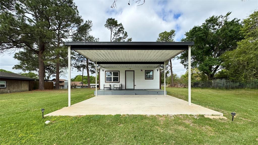 191 Harmon Road Gun Barrel City, TX 75156 - Photo 25 of 28 front view of a house with a yard