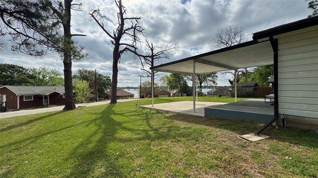 191 Harmon Road Gun Barrel City, TX 75156 - Photo 25 of 31 a view of a house with a yard