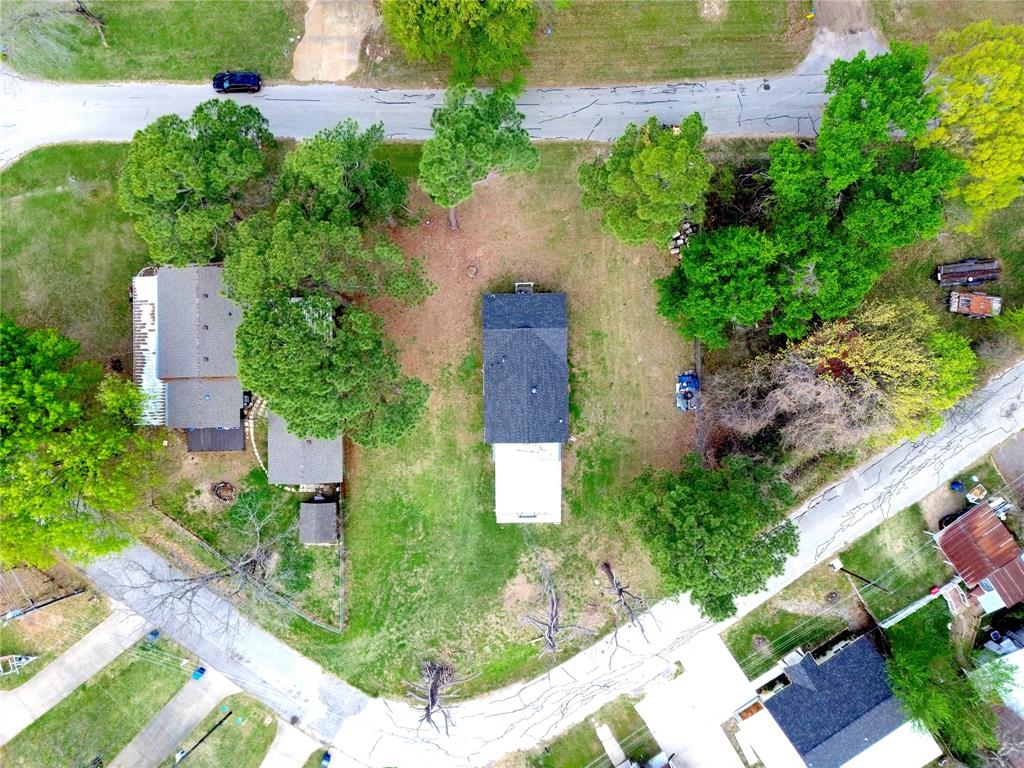 191 Harmon Road Gun Barrel City, TX 75156 - Photo 28 of 31 an aerial view of a house with a yard