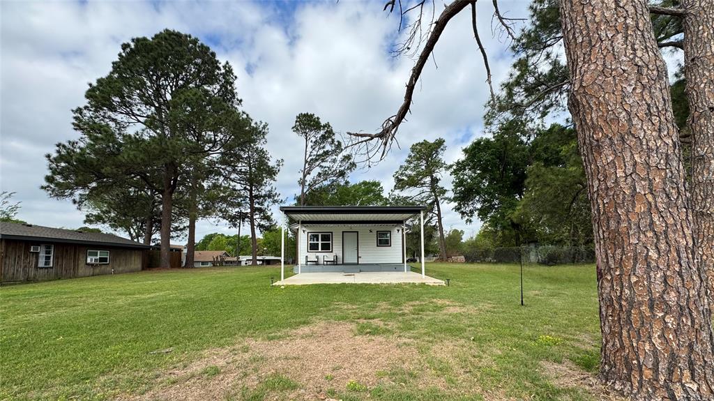 191 Harmon Road Gun Barrel City, TX 75156 - Photo 6 of 28 a front view of a house with garden