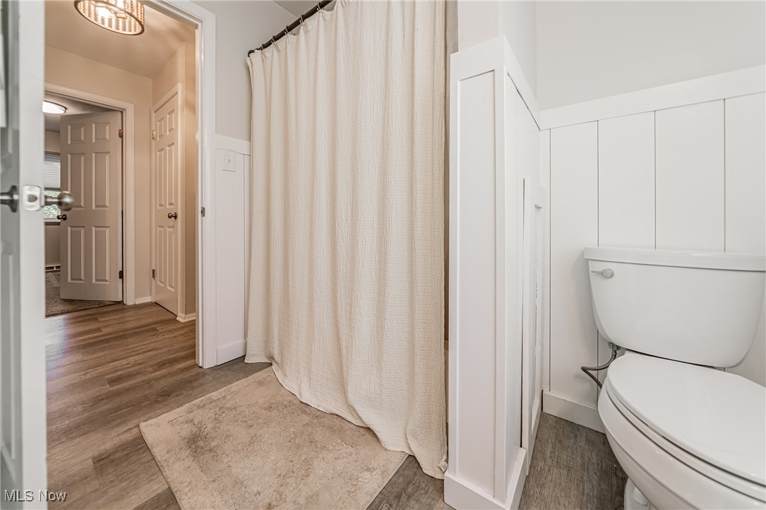 595 Moorfield Road Fairlawn, OH 44313 - Photo 24 of 50 Full bathroom with wood finished floors and a shower with curtain