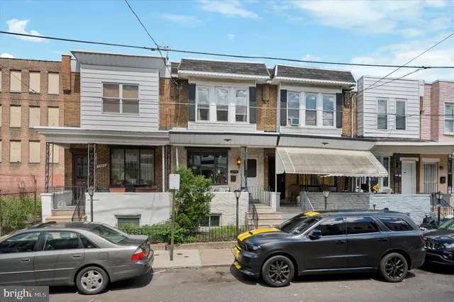 a car parked in front of a building