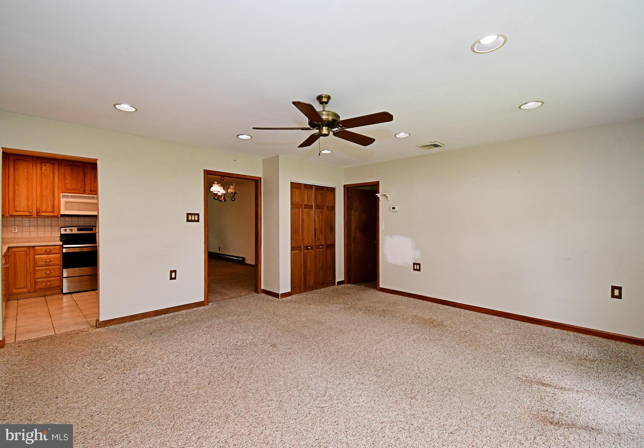 24 Conifer Road Levittown, PA 19057 - Photo 17 of 40 an empty room with closet and ceiling fan