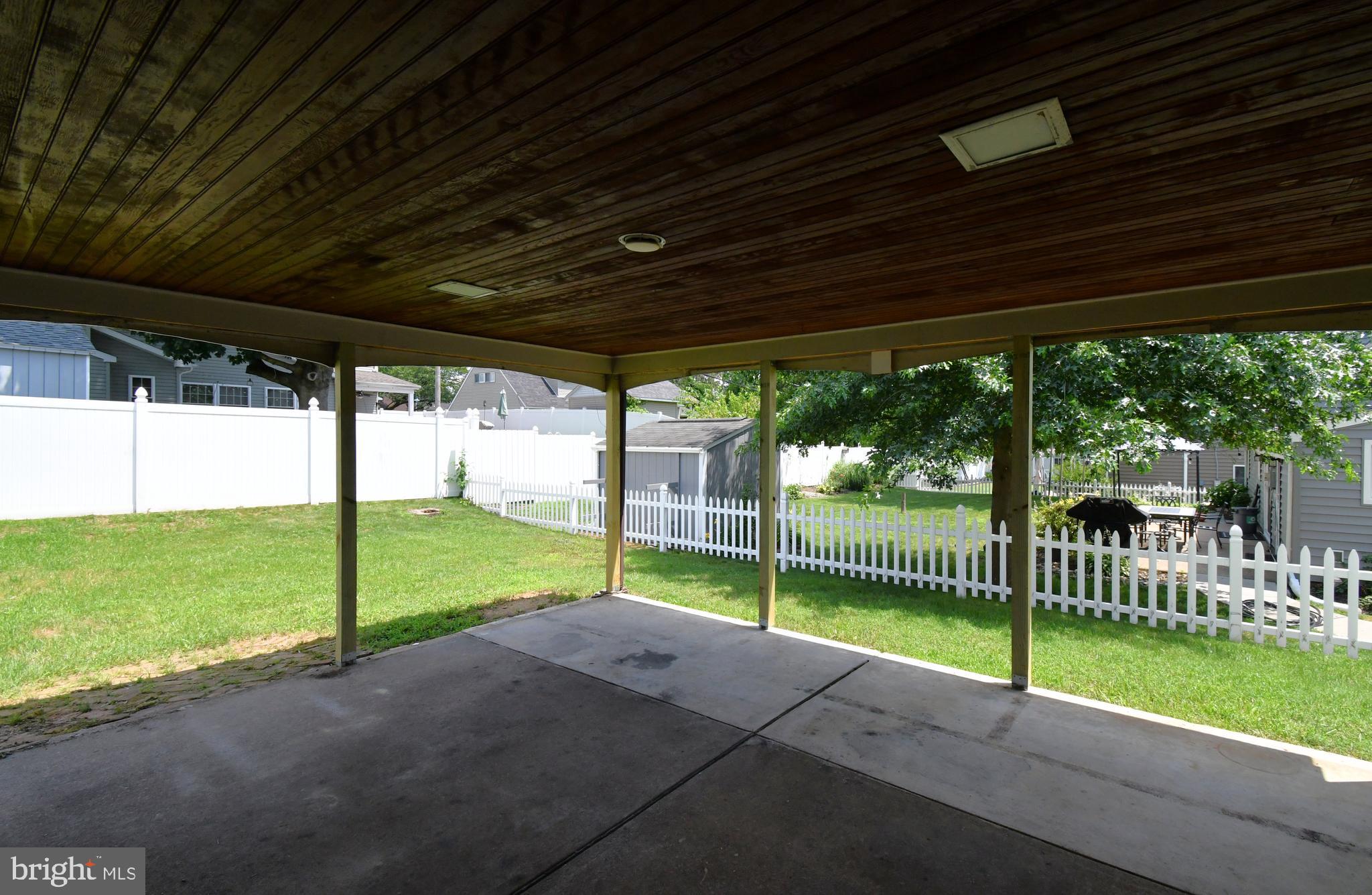 24 Conifer Road Levittown, PA 19057 - Photo 33 of 40 a view of a porch with a backyard