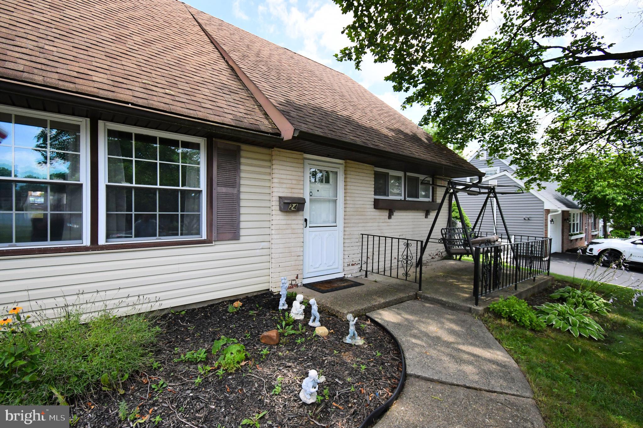 24 Conifer Road Levittown, PA 19057 - Photo 4 of 40 a view of a house with a yard and sitting area