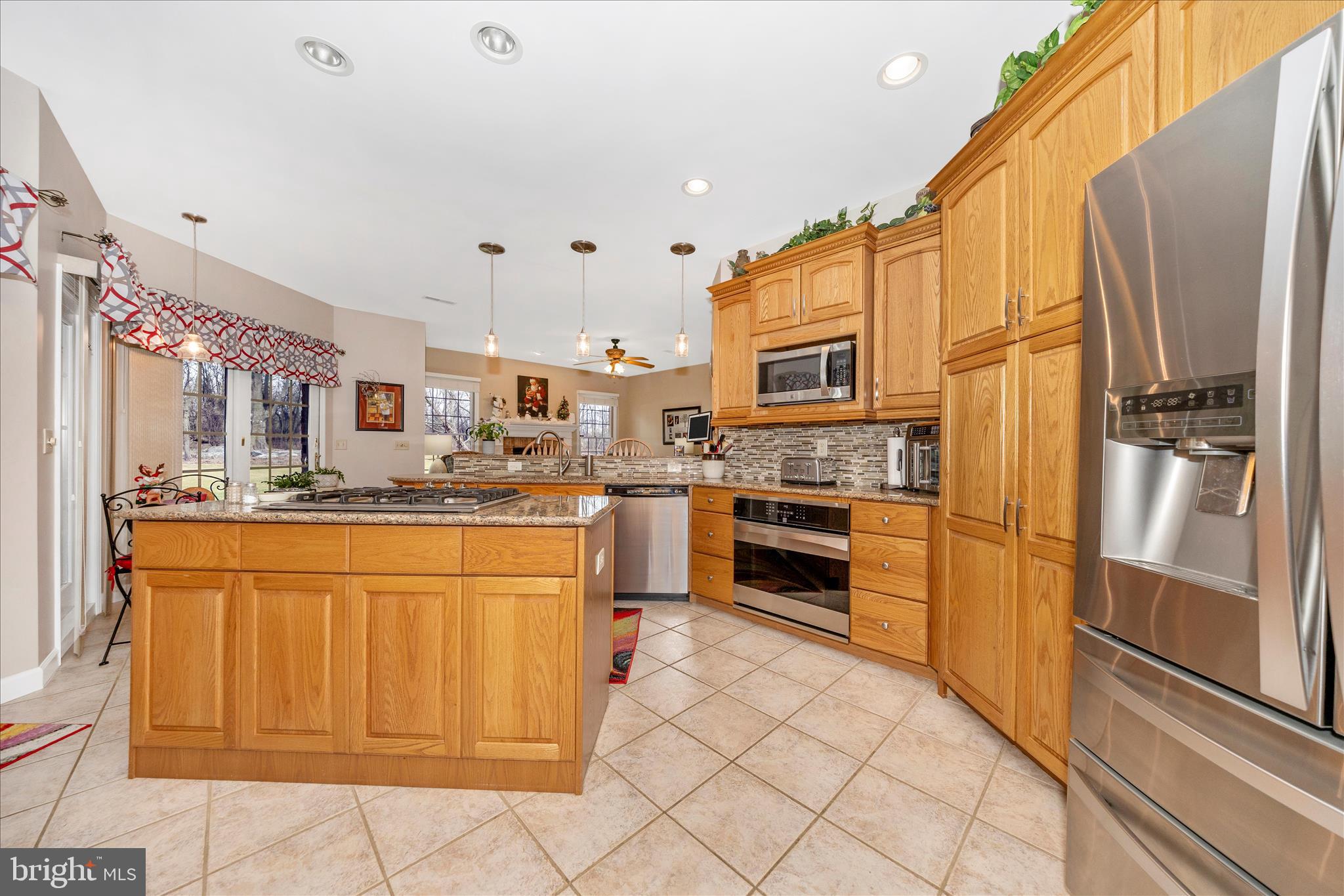 8971 Light Street Williamsport, MD 21795 - Photo 15 of 53 a kitchen with stainless steel appliances a refrigerator sink and cabinets