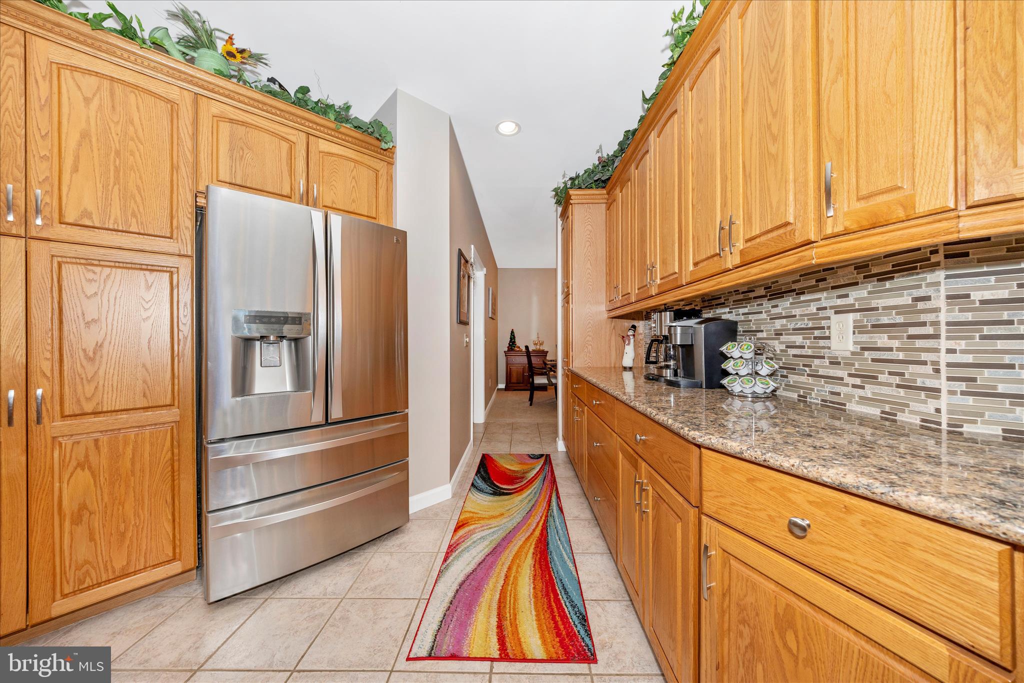 8971 Light Street Williamsport, MD 21795 - Photo 16 of 53 a kitchen with stainless steel appliances granite countertop a refrigerator and a stove