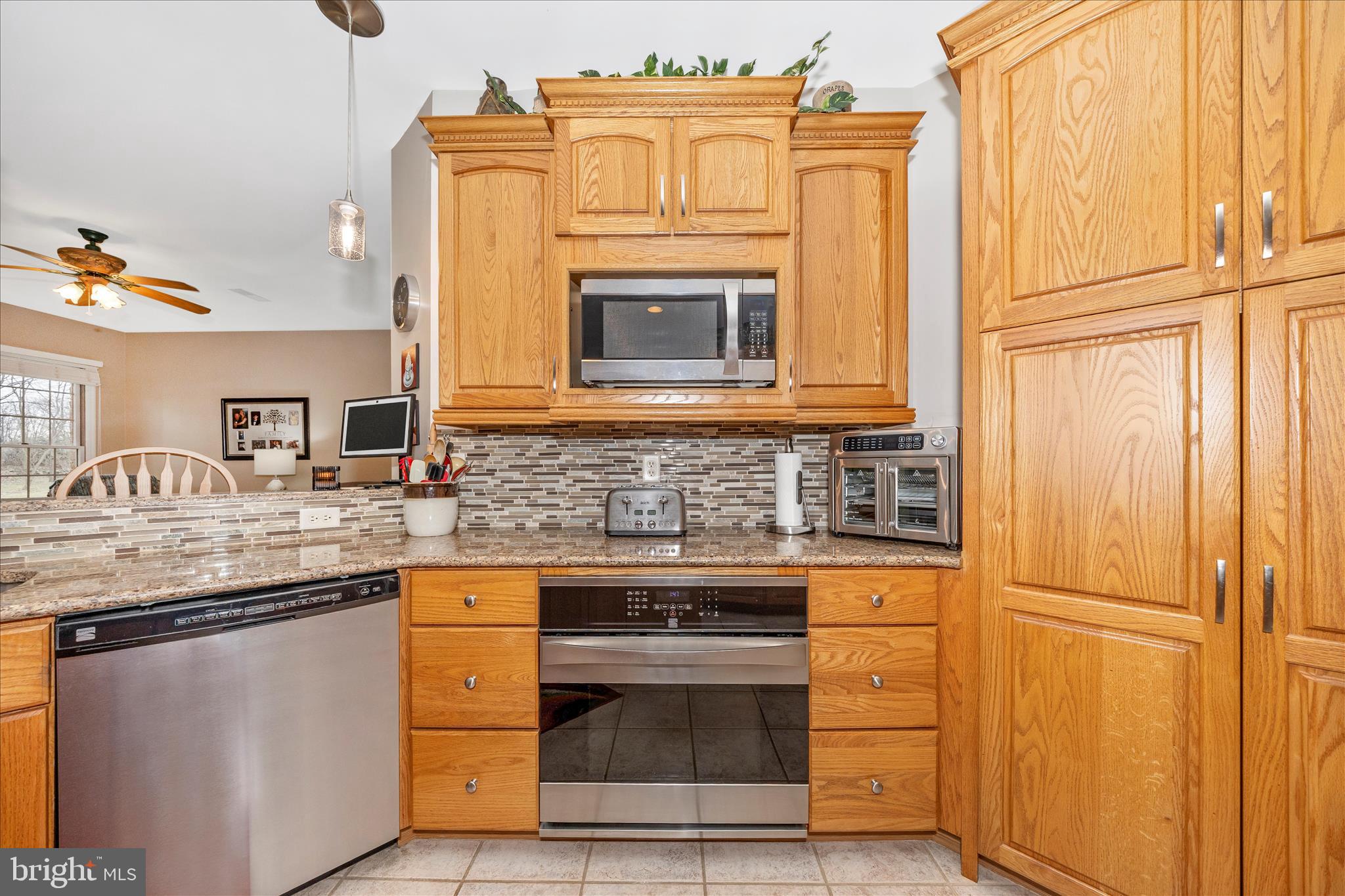 8971 Light Street Williamsport, MD 21795 - Photo 20 of 53 a kitchen with stainless steel appliances granite countertop a stove and a refrigerator