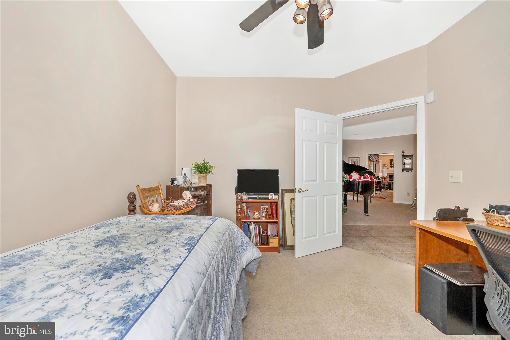 8971 Light Street Williamsport, MD 21795 - Photo 33 of 53 a bedroom with a bed and a flat tv screen on the dresser
