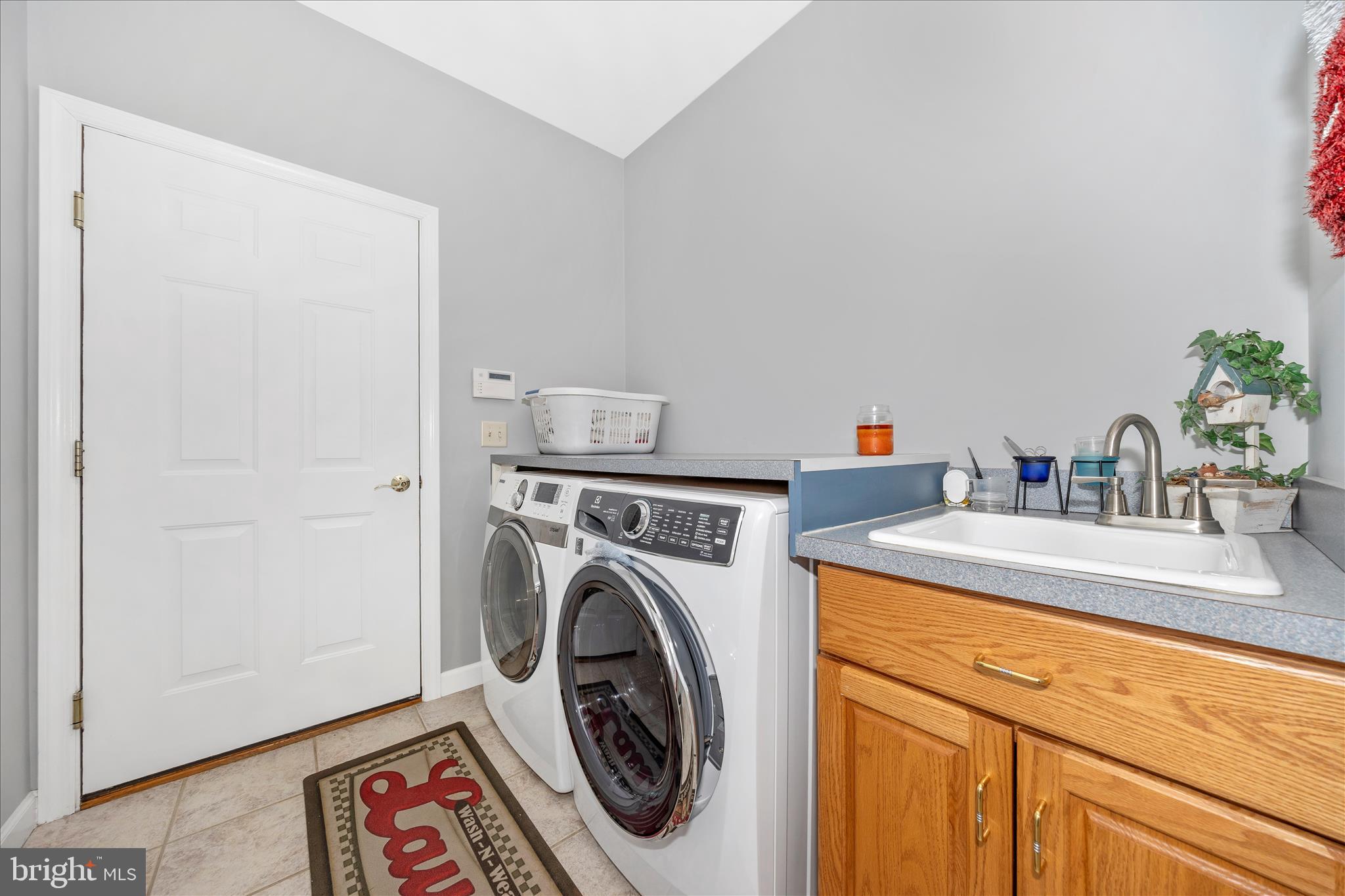 8971 Light Street Williamsport, MD 21795 - Photo 43 of 53 a utility room with dryer and washer