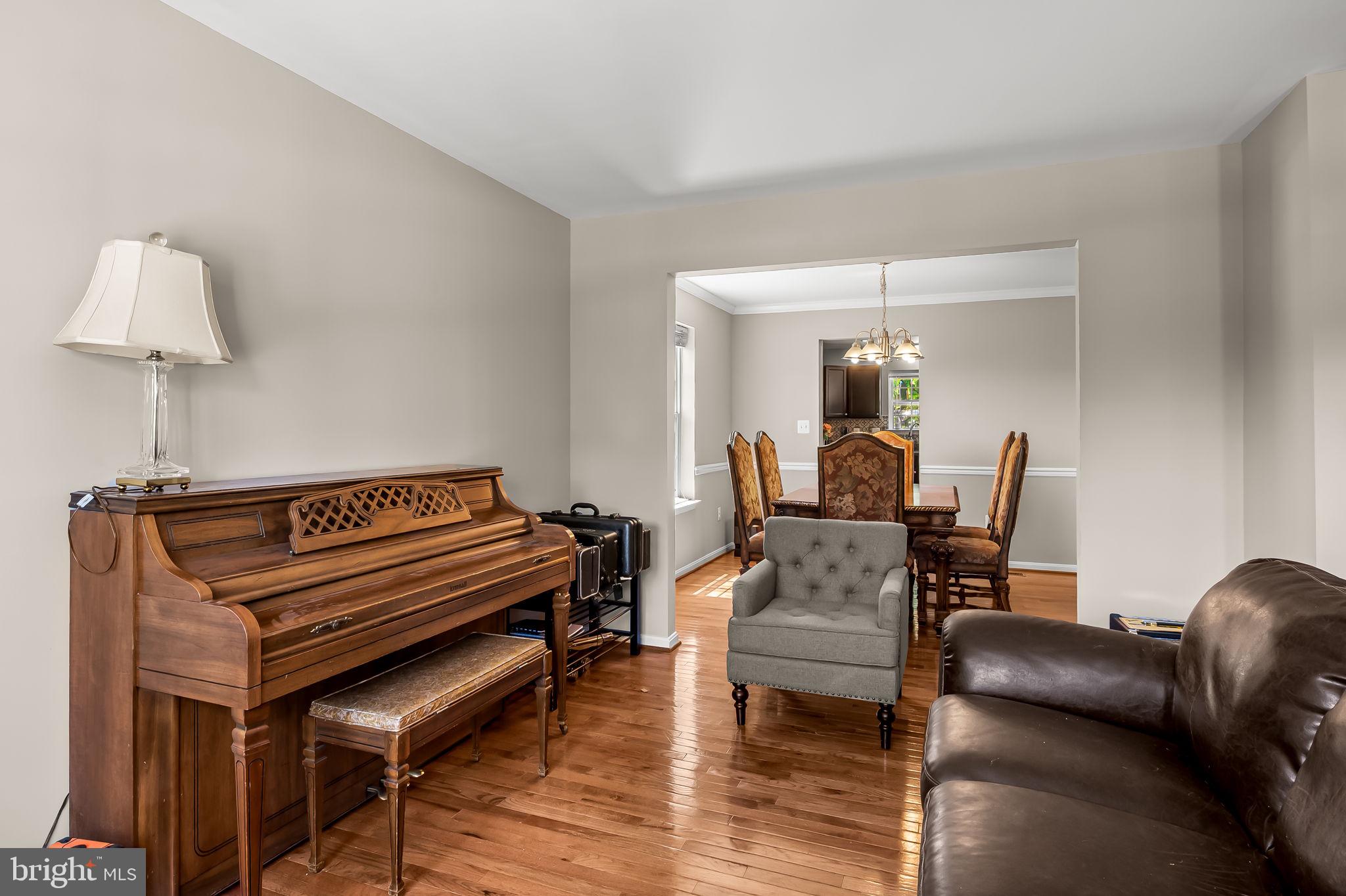 6008 Hanover Road Elkridge, MD 21075 - Photo 5 of 36 a view of a livingroom with furniture and a couch