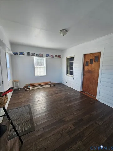 a view of livingroom with hardwood floor and window