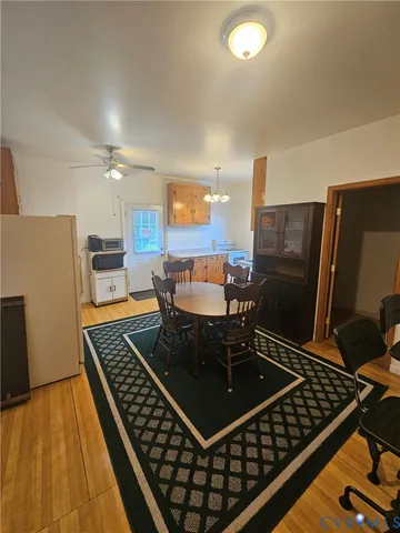 a kitchen with a black appliances and cabinets