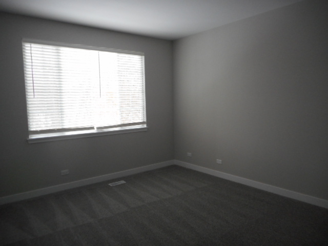 710 Timothy Court East Dundee, IL 60118 - Photo 14 of 25 an empty room with a window