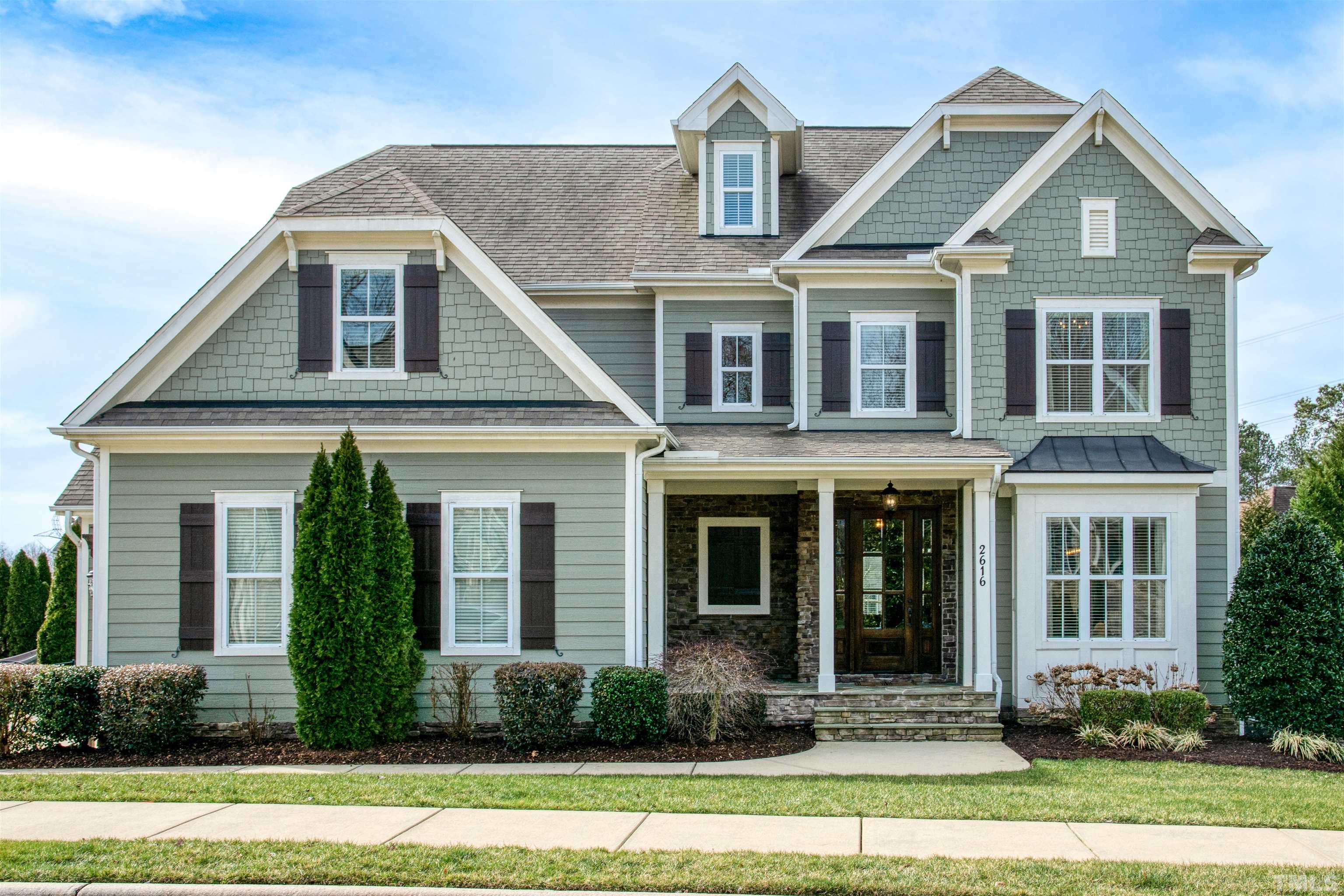 2616 Peachleaf Street Raleigh, NC 27614 - Photo 1 of 3 a front view of a house with a yard