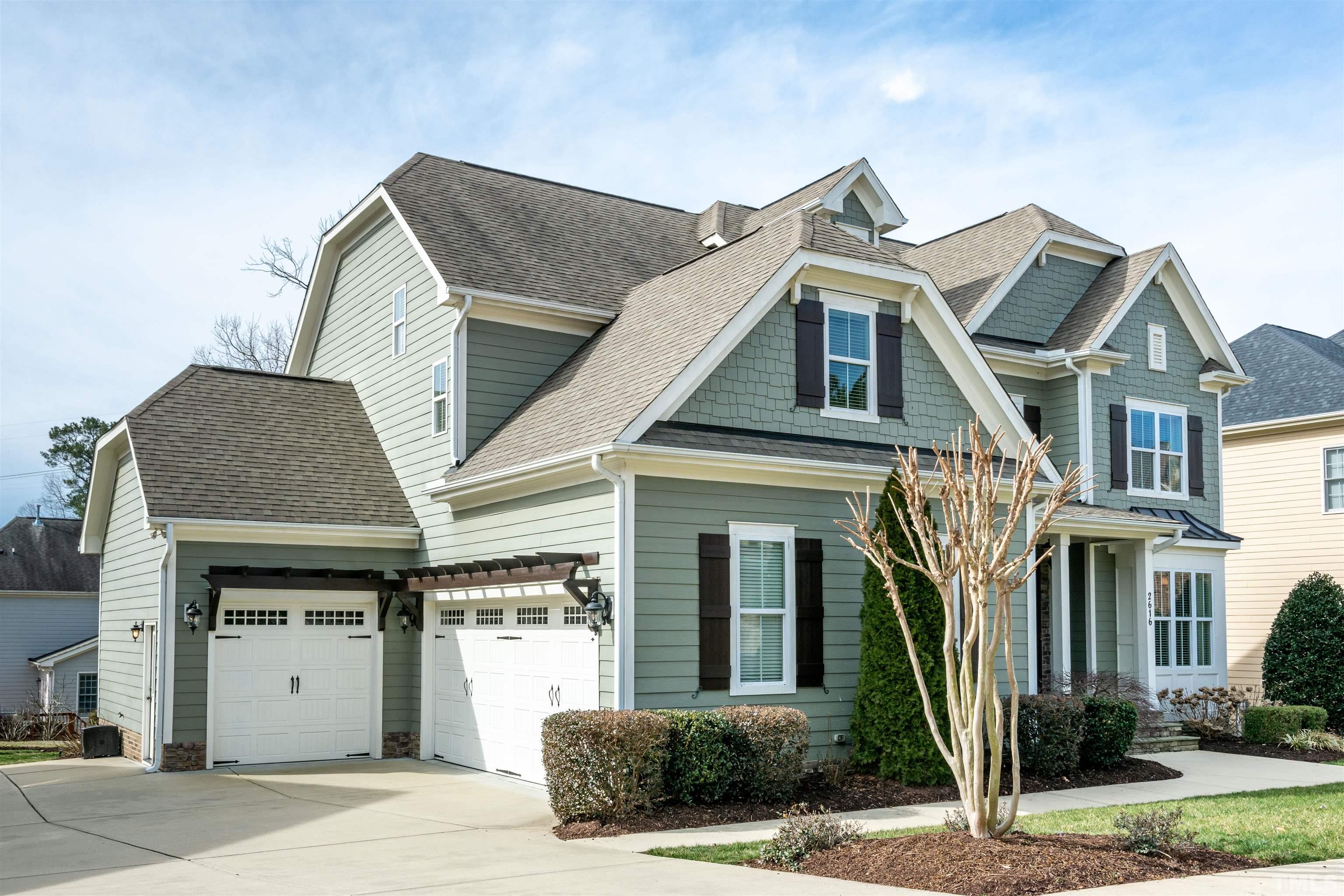 2616 Peachleaf Street Raleigh, NC 27614 - Photo 2 of 3 a front view of a house with garage