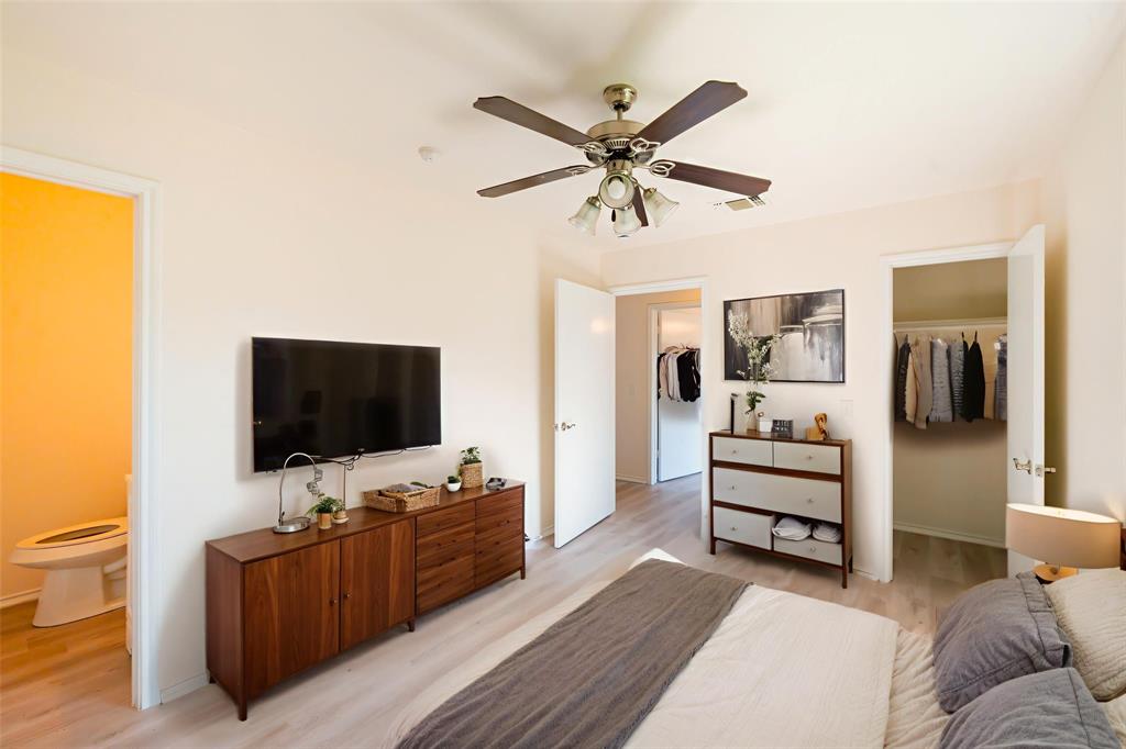 714 East 12th Street Bonham, TX 75418 - Photo 5 of 18 a living room with furniture and a flat screen tv