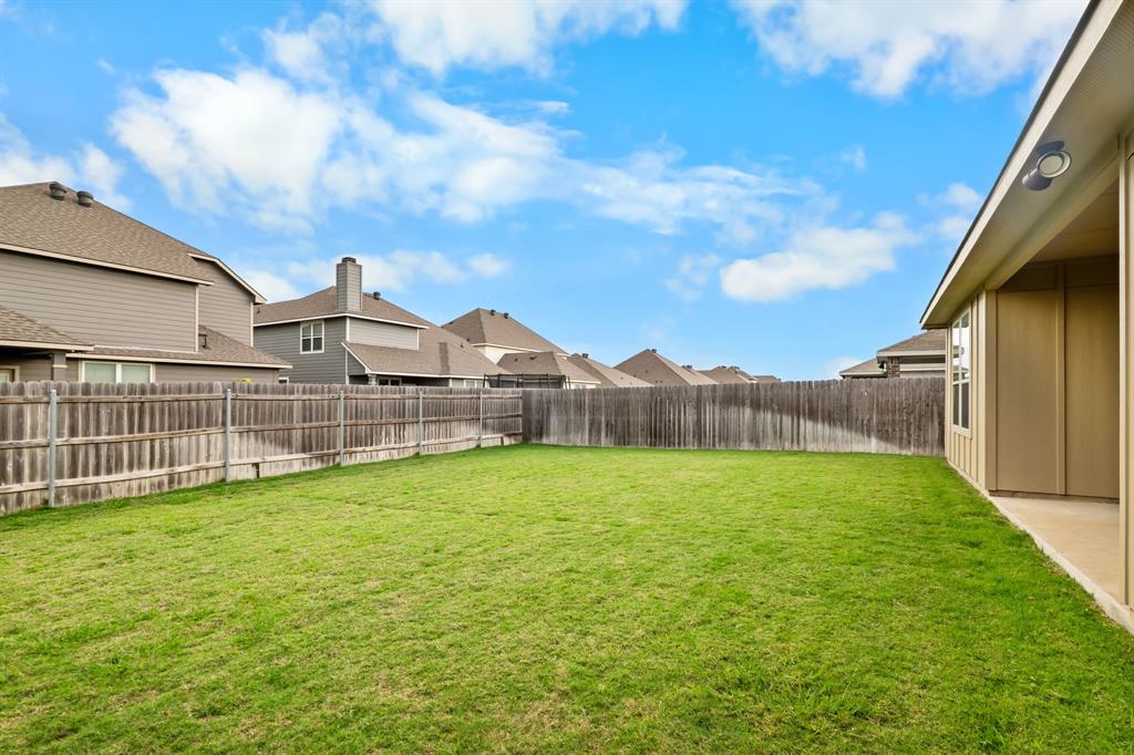 11233 Solar Street Lorena, TX 76655 - Photo 25 of 33 fully fenced yard and covered porch