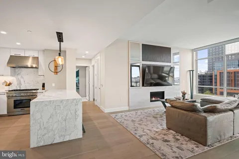 a view of a livingroom with furniture and window