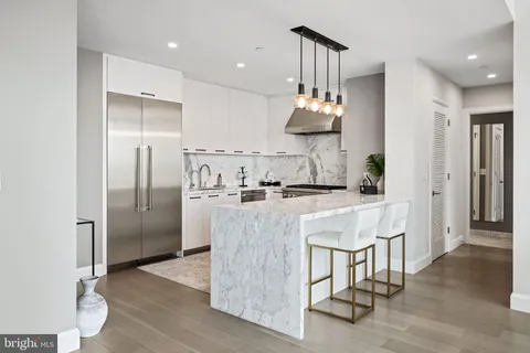 a bathroom with a double vanity sink mirror and double