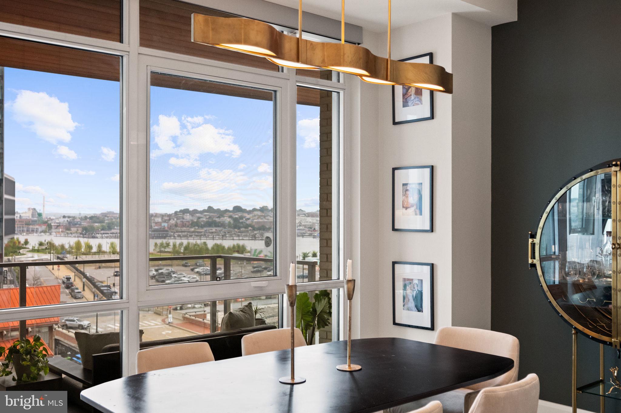 1330 Lancaster Street, Unit C603 Baltimore, MD 21231 - Photo 20 of 63 a view of living room and kitchen with furniture