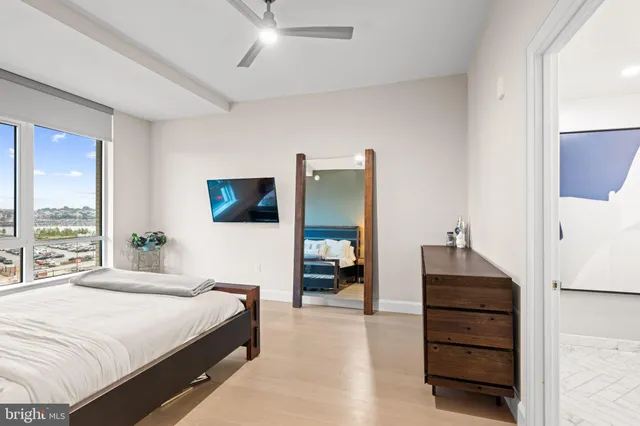a bathroom with double vanity sinks and a mirror